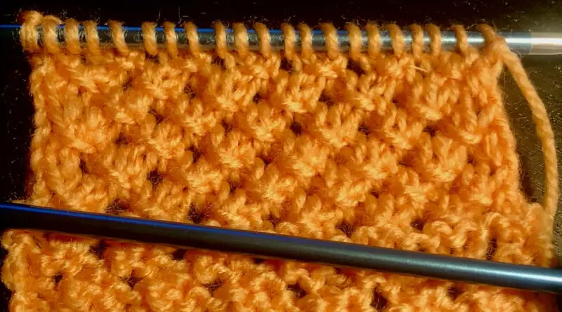 Le point de dentelle nouée au tricot